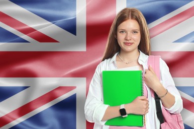 Image of Student with notebooks and backpack against flag of United Kingdom. Language school
