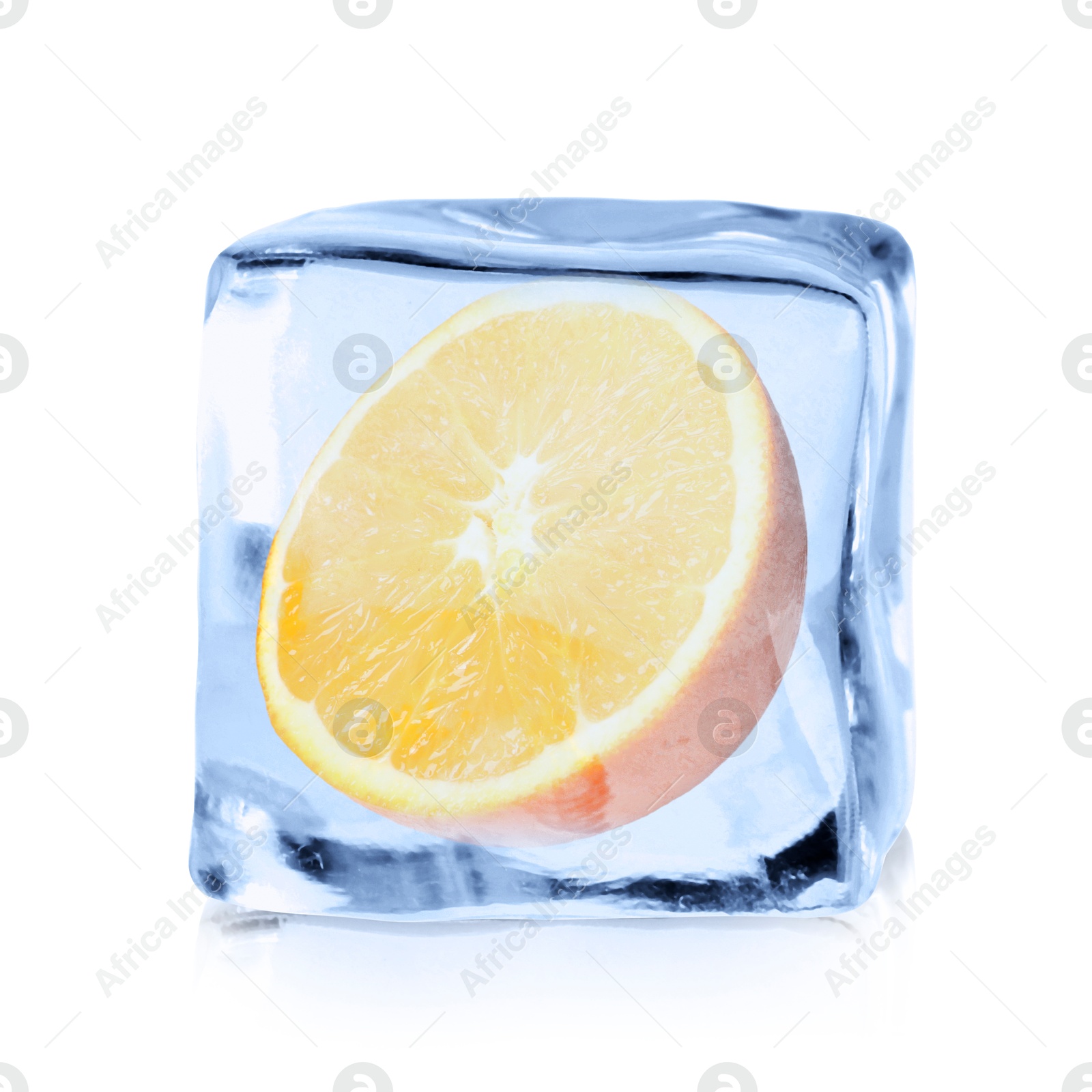 Image of Half of fresh orange inside ice cube on white background