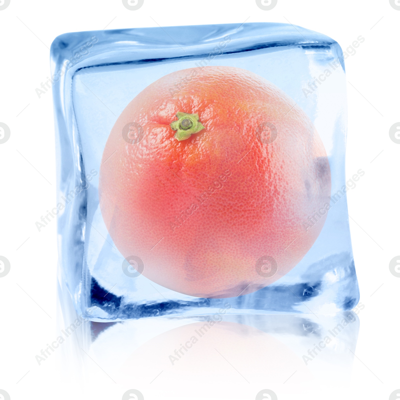 Image of Fresh grapefruit inside ice cube on white background