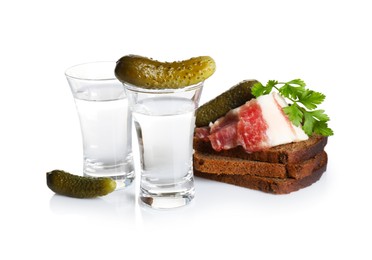 Photo of Russian vodka and different appetizers isolated on white