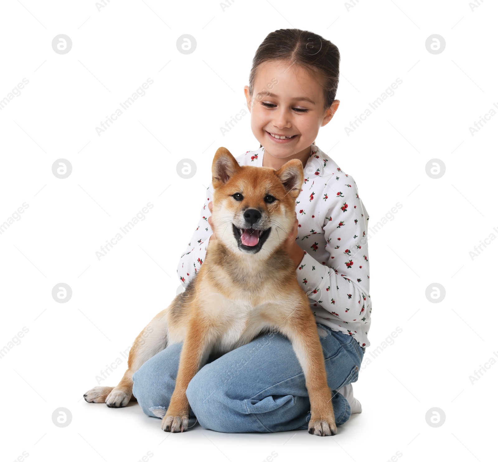 Smiling little girl with her dog on white background. Child and pet Photo of Smiling little girl with her dog on white background. Child and pet