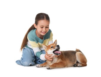 Photo of Smiling little girl with her dog on white background. Child and pet