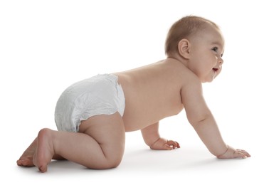 Photo of Cute little baby in diaper on white background