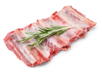 Photo of Fresh raw beef ribs and rosemary isolated on white