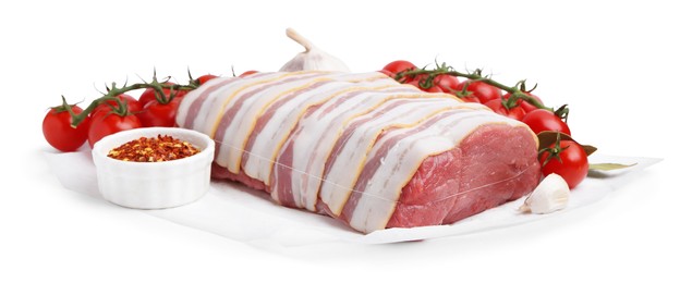 Photo of Piece of raw beef meat, tomatoes and spices isolated on white