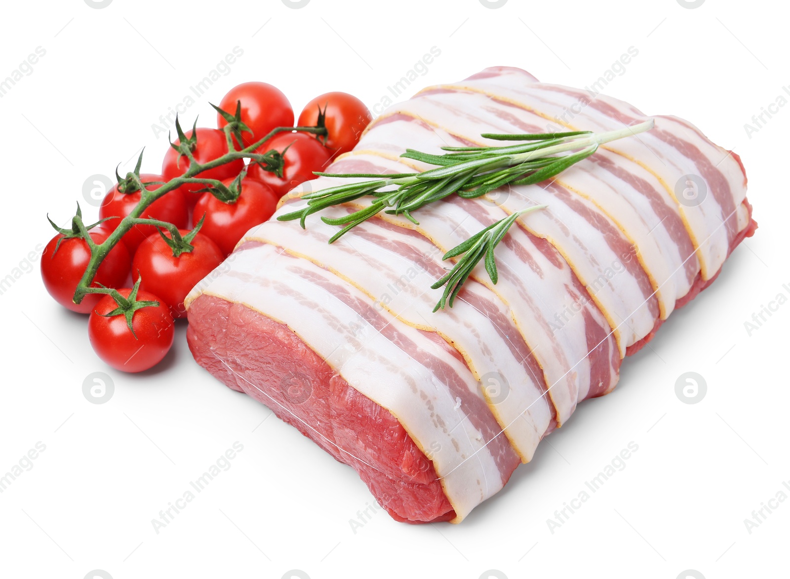 Piece of raw beef meat, tomatoes and rosemary isolated on white Photo of Piece of raw beef meat, tomatoes and rosemary isolated on white