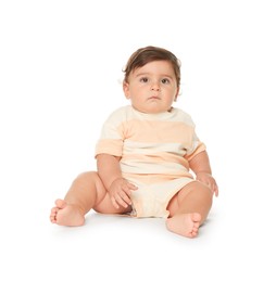 Photo of Cute little baby sitting on white background