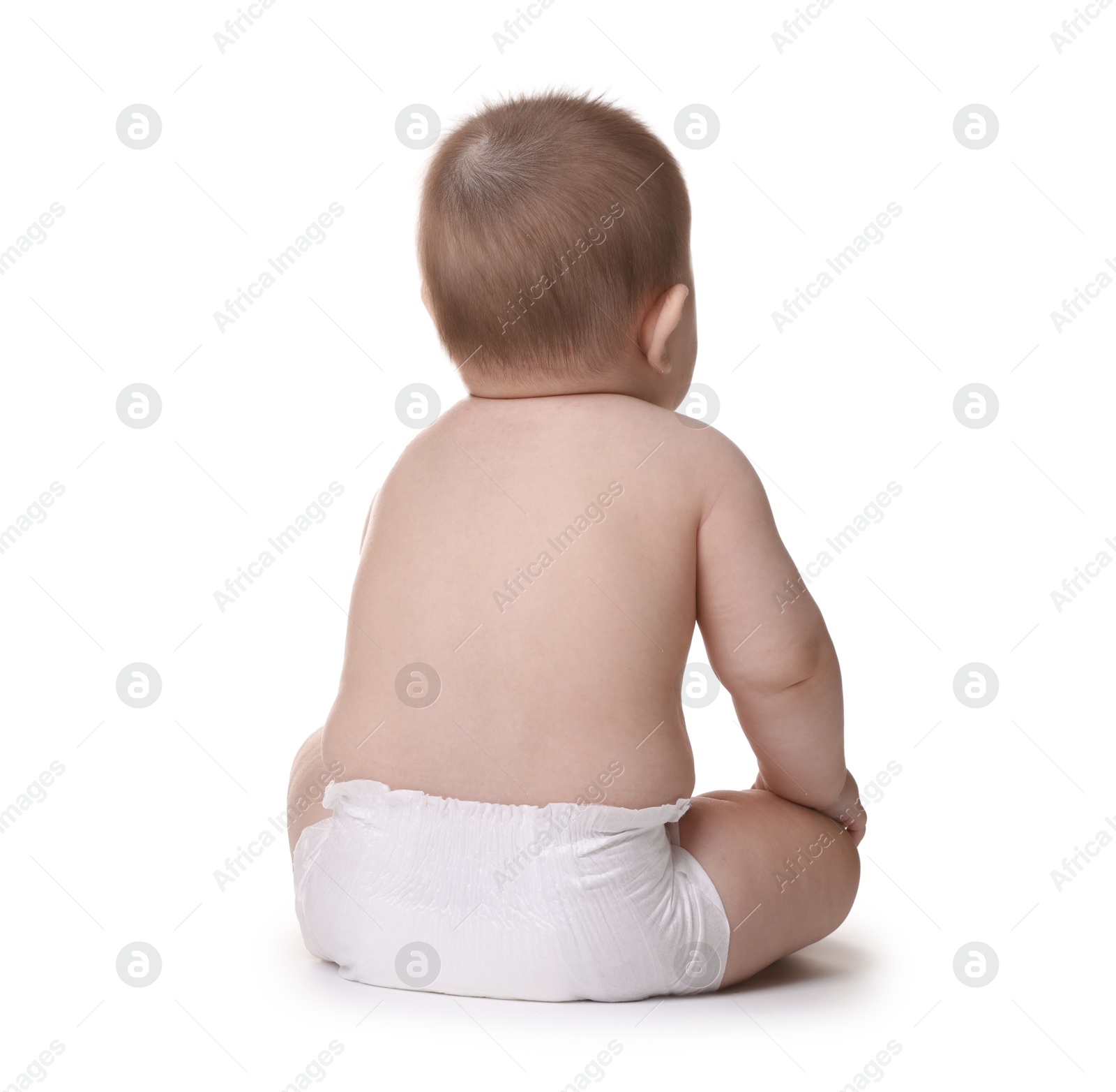 Cute little baby in diaper sitting on white background, back view Photo of Cute little baby in diaper sitting on white background, back view