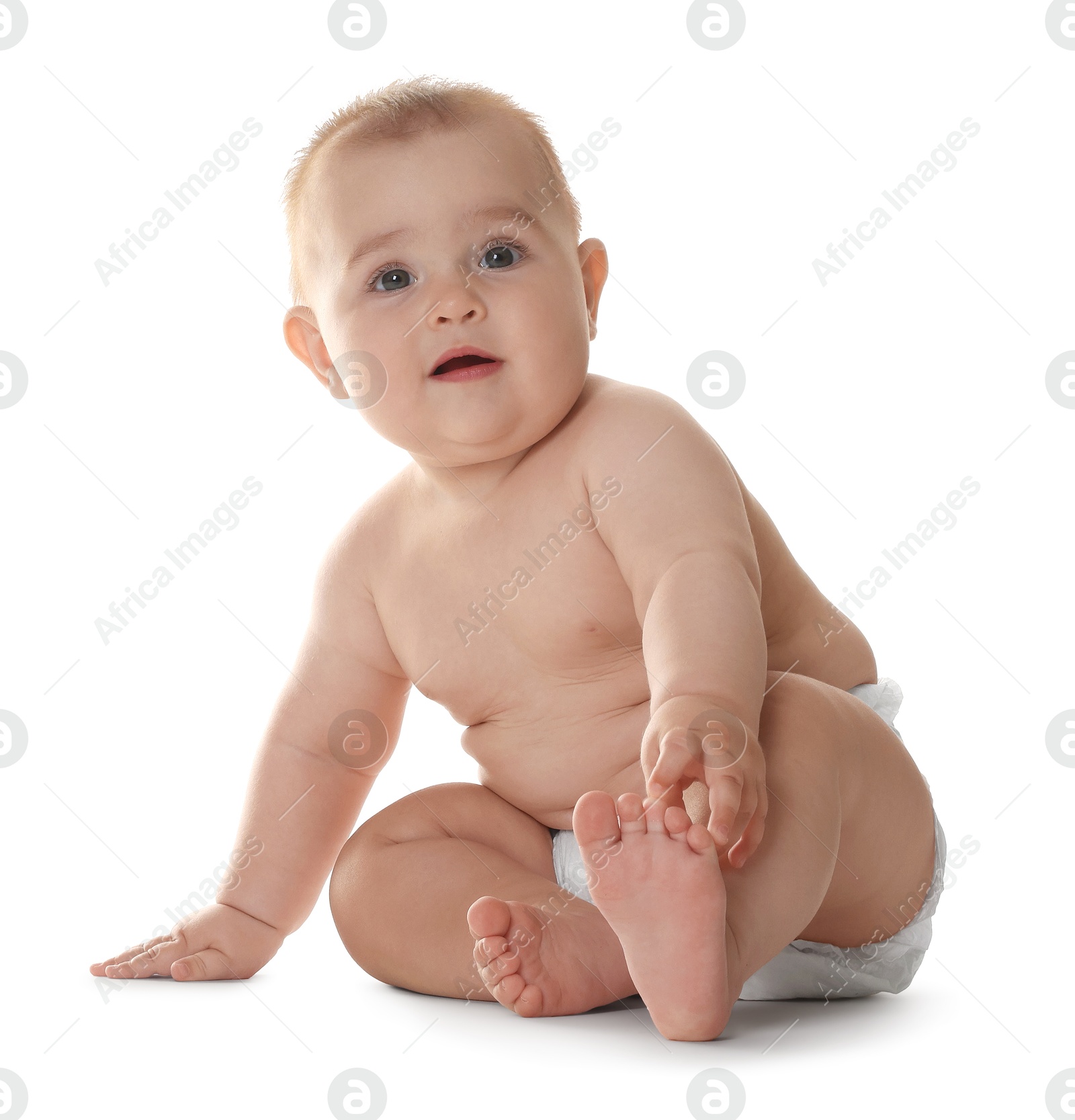 Cute little baby in diaper sitting on white background Photo of Cute little baby in diaper sitting on white background