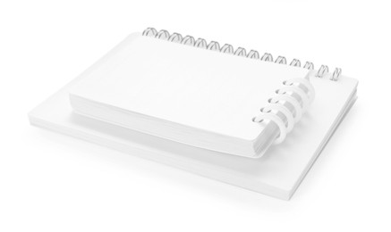Photo of Stylish notebooks with spiral isolated on white