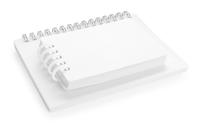 Photo of Stylish notebooks with spiral isolated on white