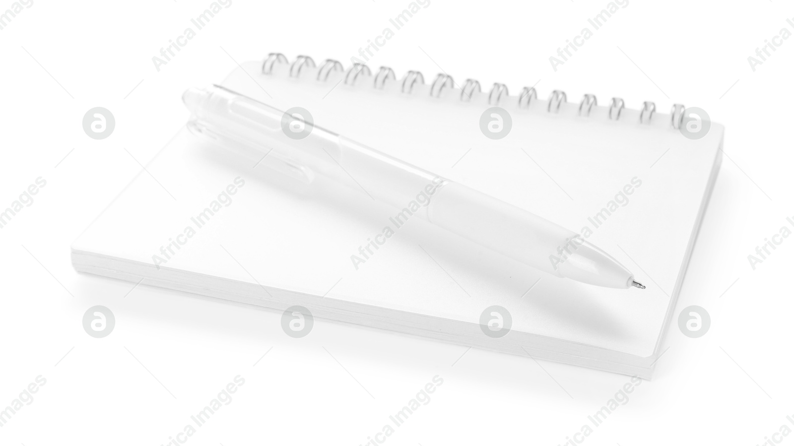 Stylish notebook and pen isolated on white Photo of Stylish notebook and pen isolated on white