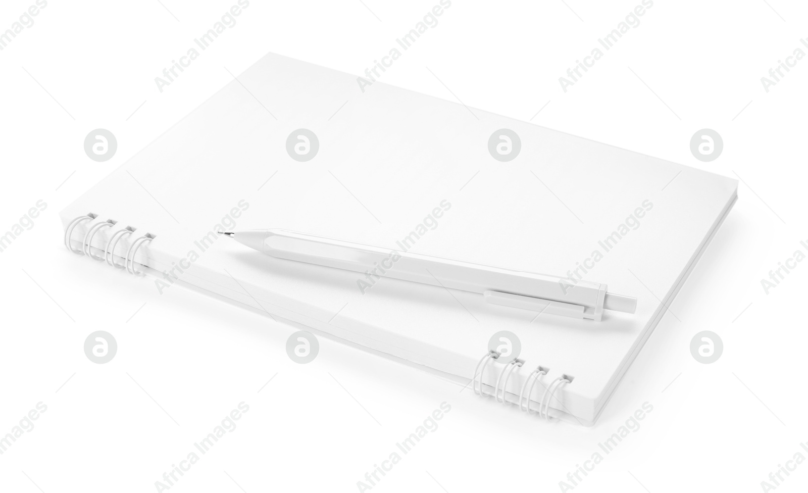 Stylish notebook and pen isolated on white Photo of Stylish notebook and pen isolated on white