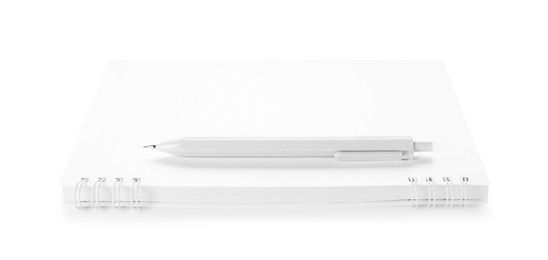 Photo of Stylish notebook and pen isolated on white