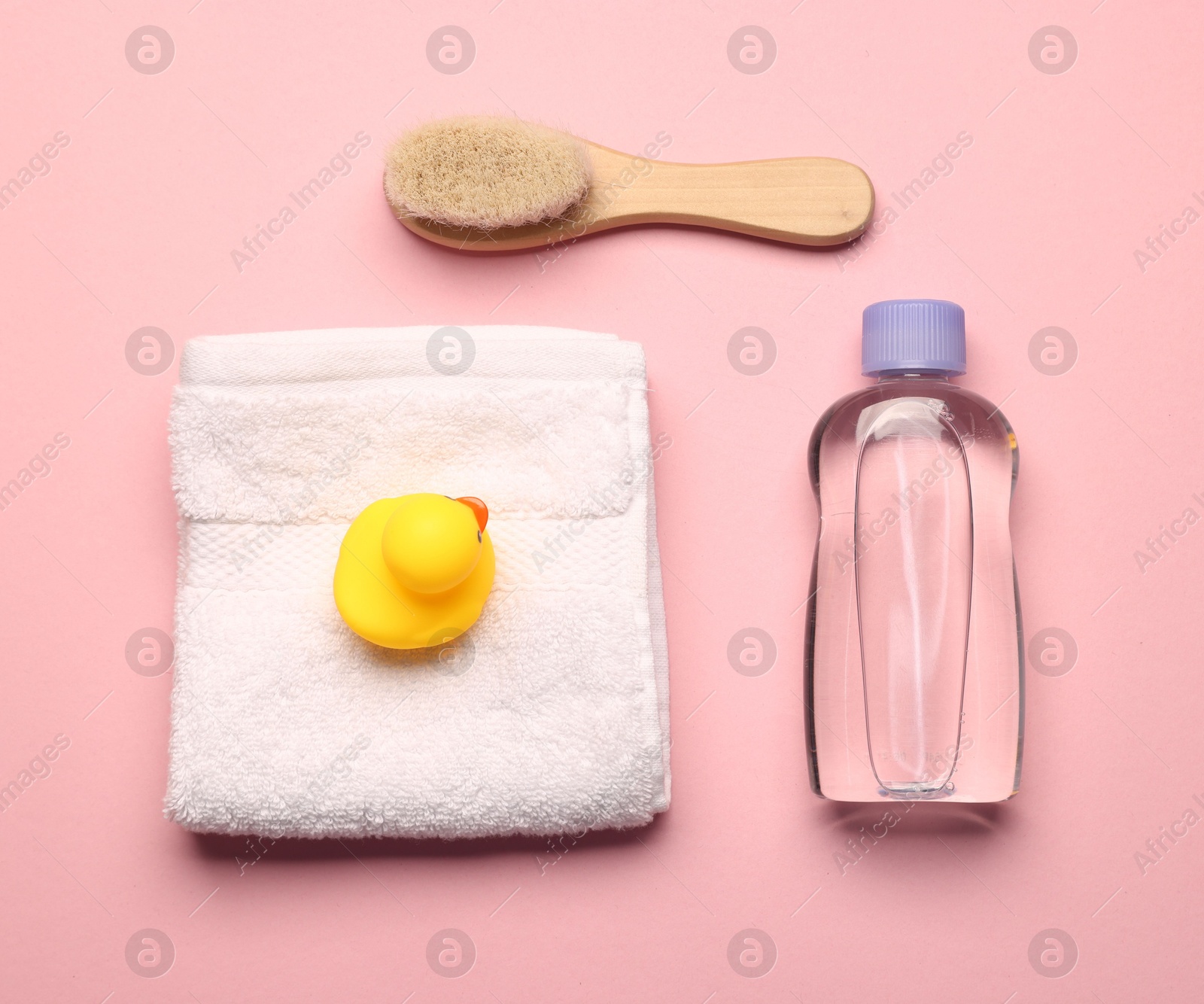 Photo of Baby bath accessories on pink background, flat lay