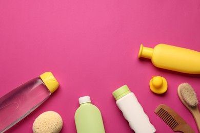 Photo of Baby bath accessories and care products on crimson background, flat lay. Space for text