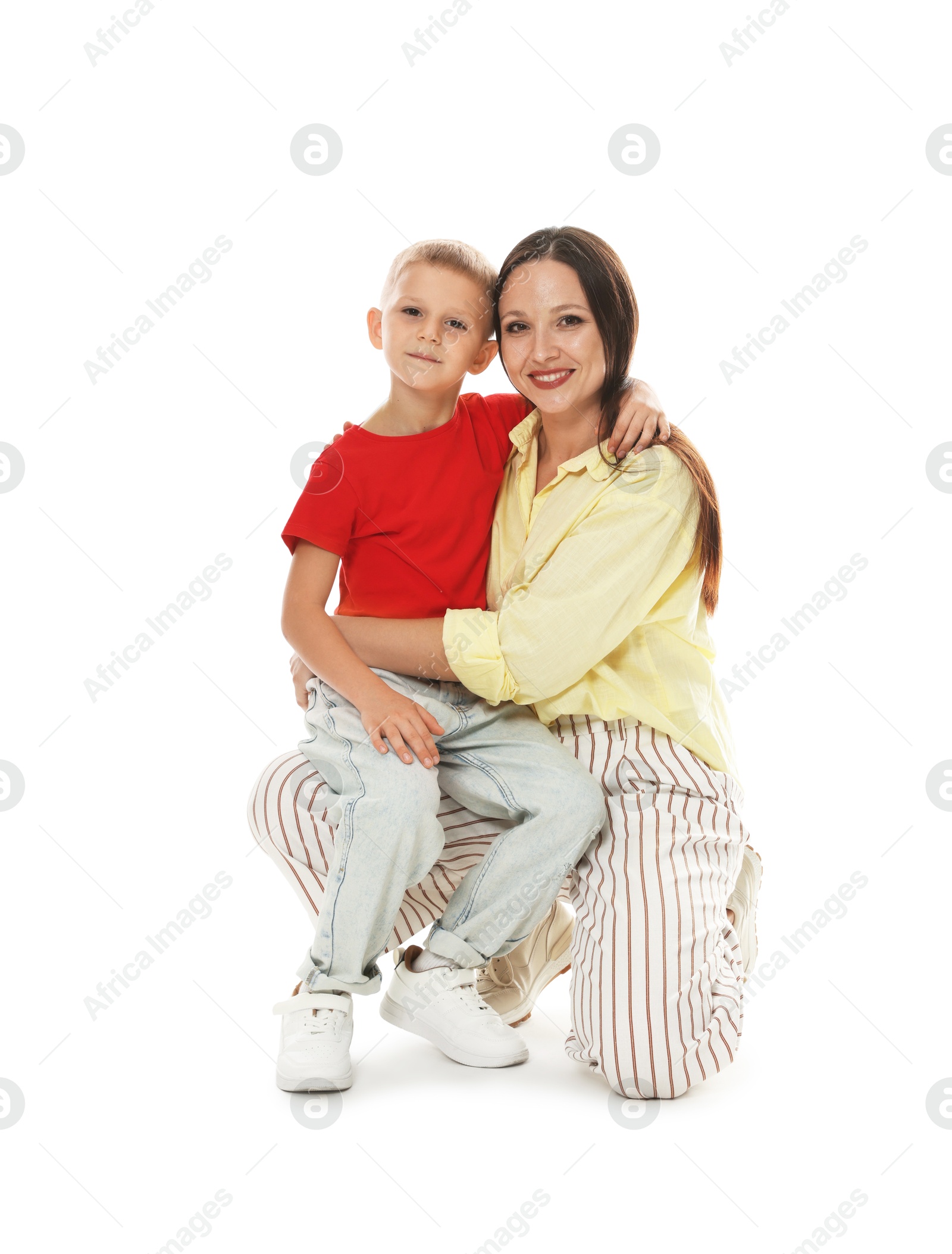 Happy mother and son on white background Photo of Happy mother and son on white background