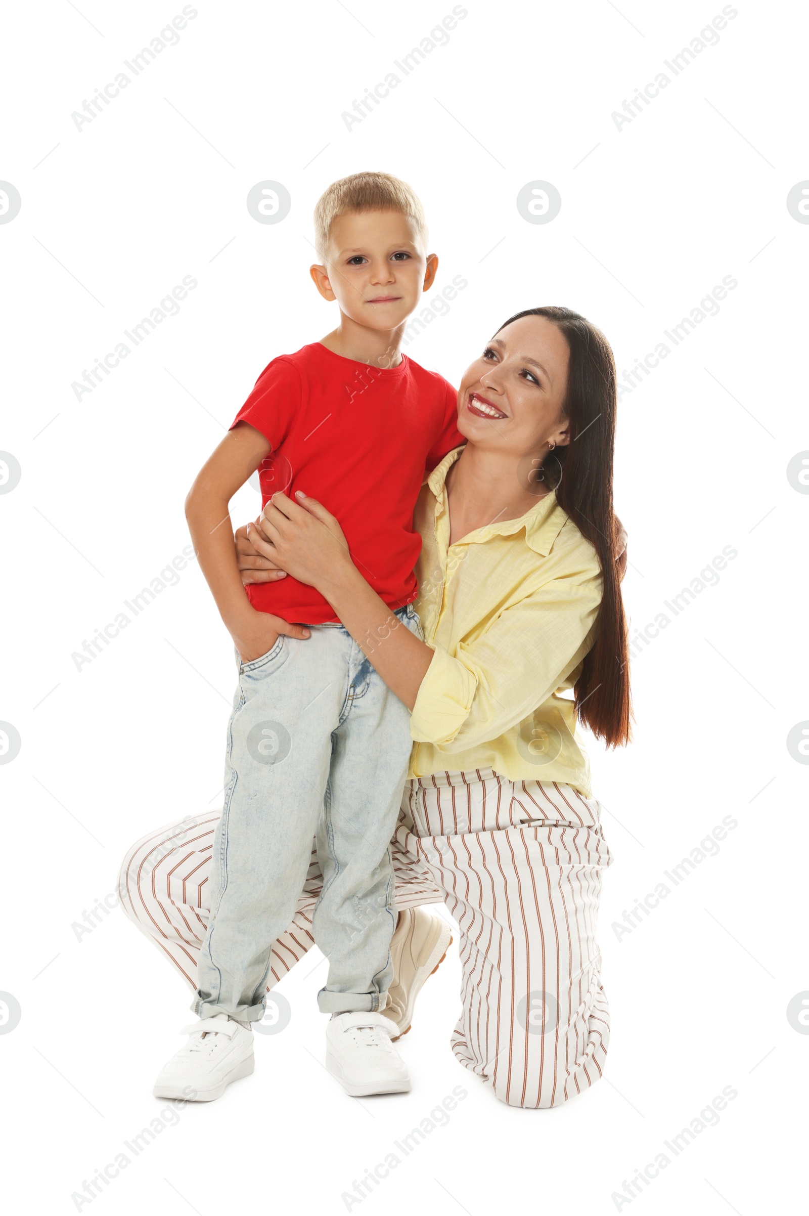 Happy mother and son on white background Photo of Happy mother and son on white background