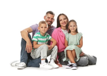 Photo of Lovely family posing together on white background