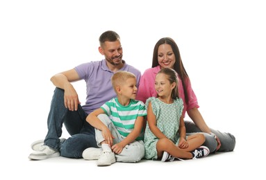 Photo of Lovely family posing together on white background