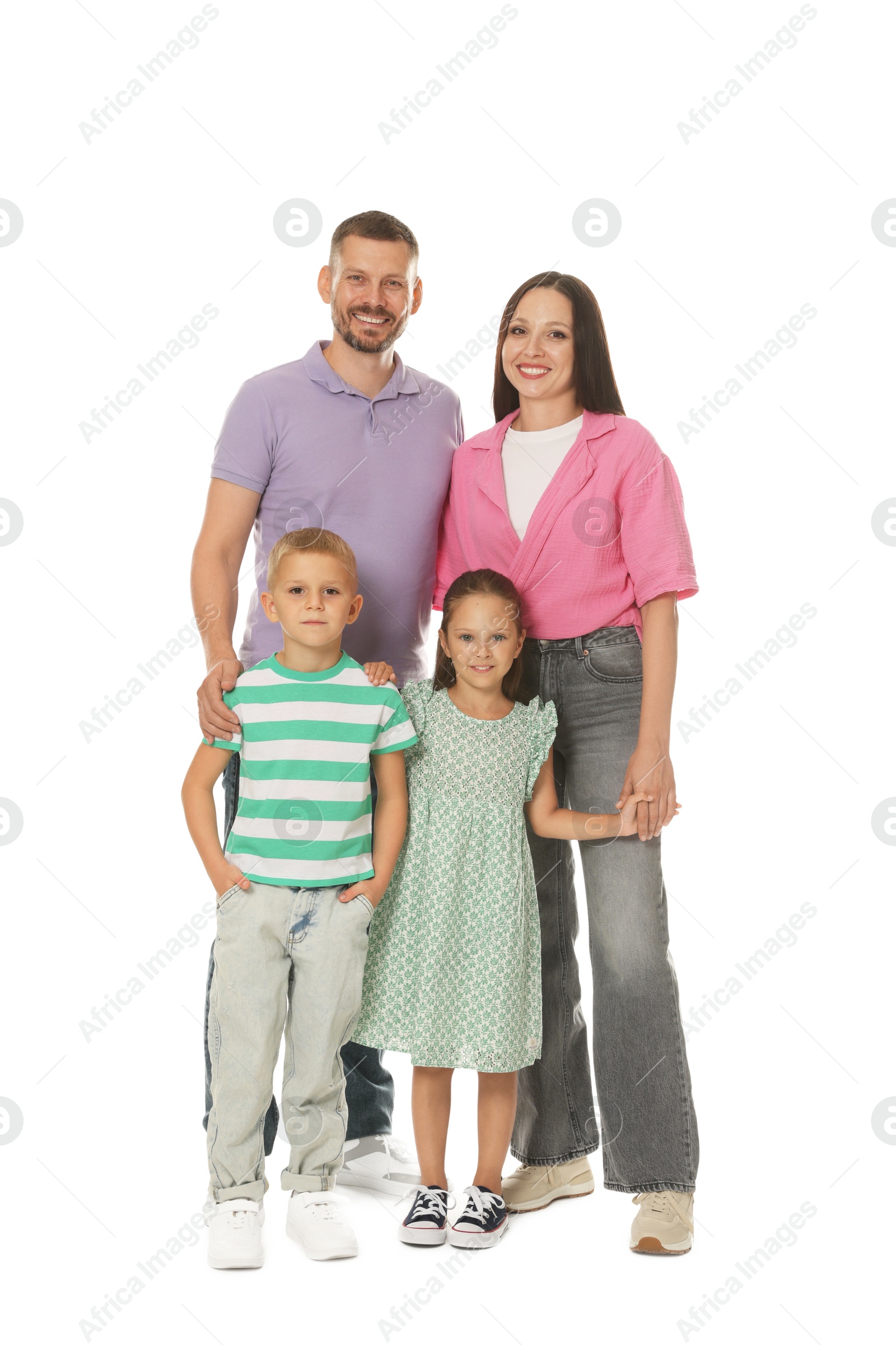 Photo of Lovely family posing together on white background