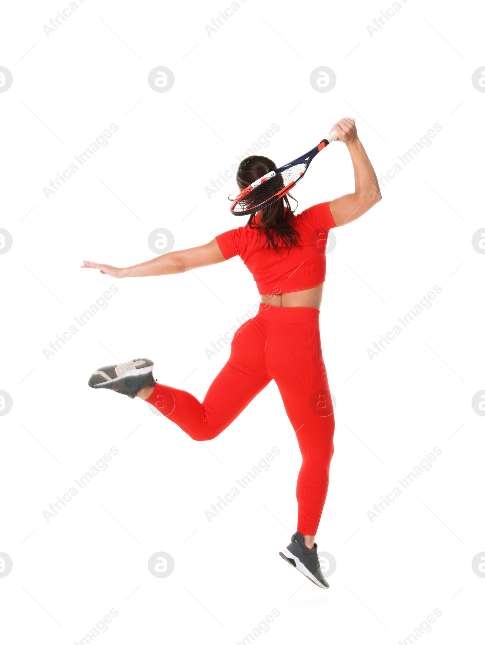 Woman with racket playing tennis on white background, back view Photo of Woman with racket playing tennis on white background, back view