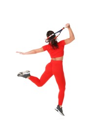 Photo of Woman with racket playing tennis on white background, back view