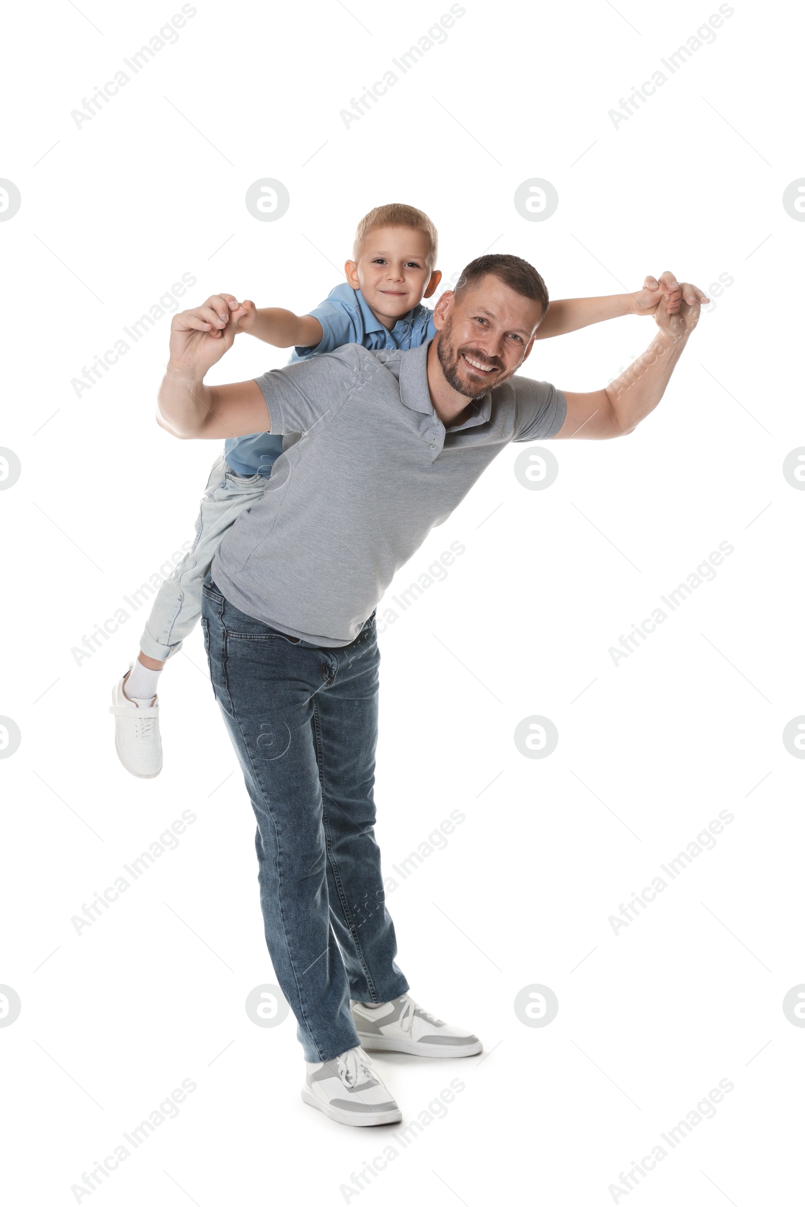 Photo of Father and son having fun on white background