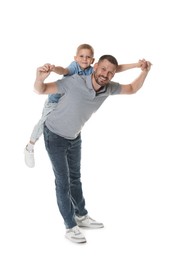 Photo of Father and son having fun on white background