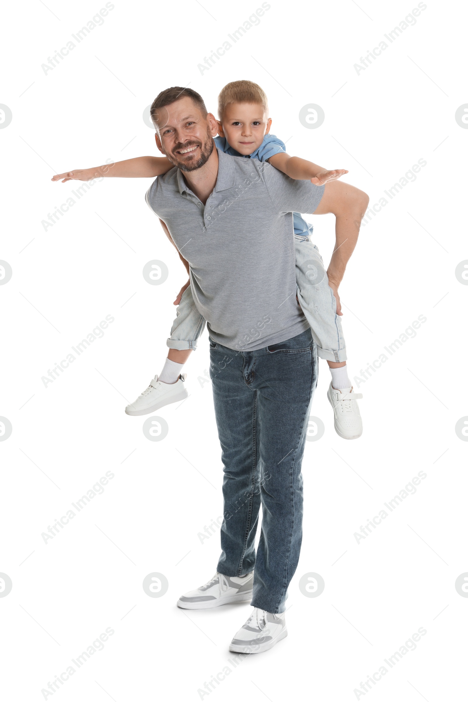 Photo of Father and son having fun on white background