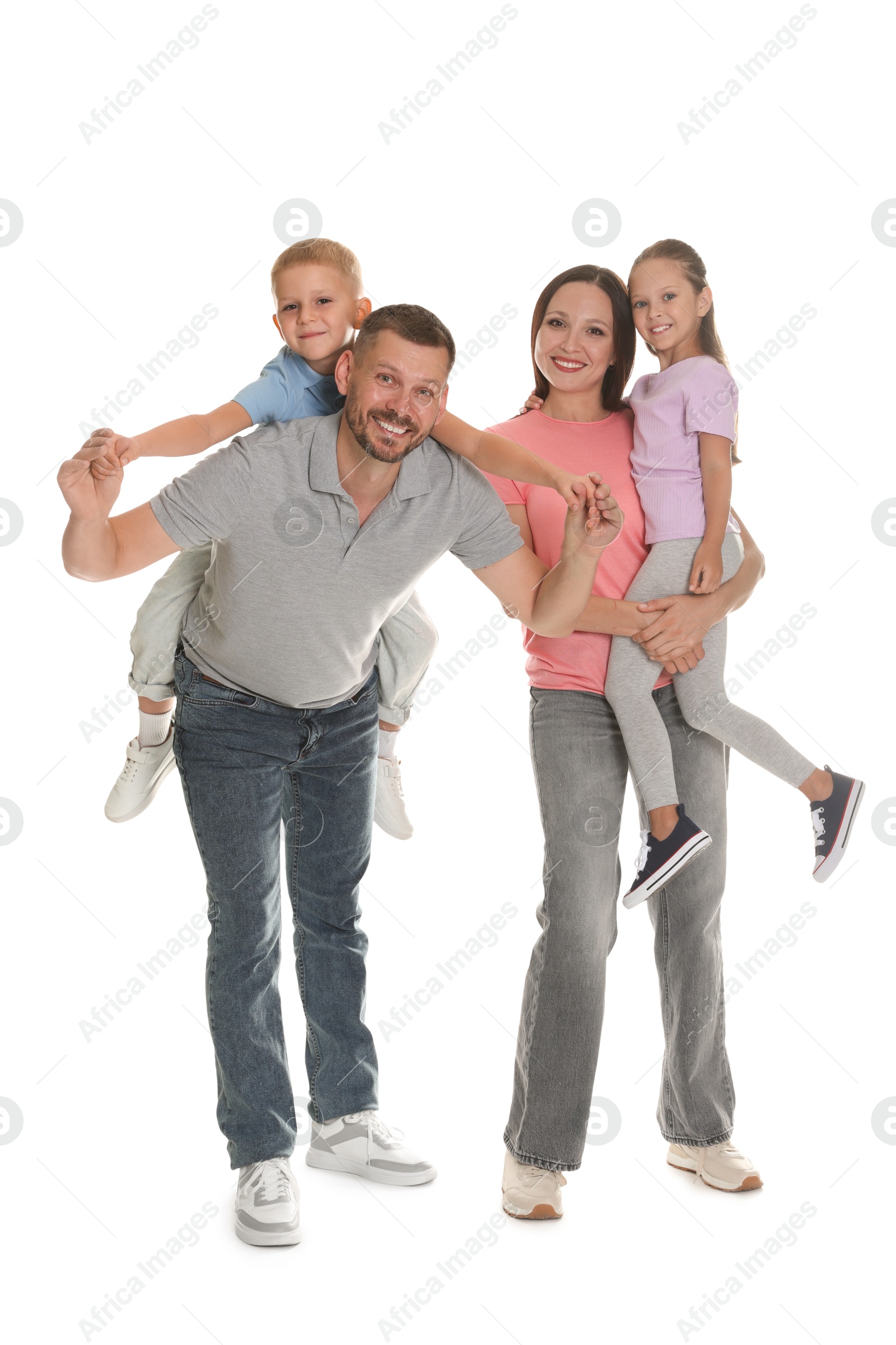 Happy family having fun on white background Photo of Happy family having fun on white background
