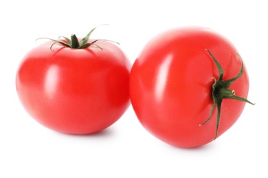 Photo of Two ripe red tomatoes isolated on white