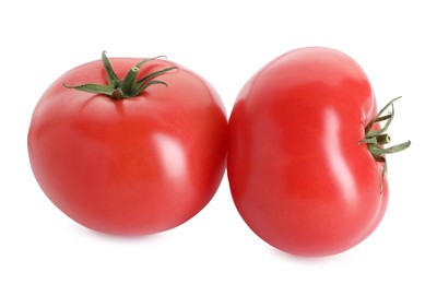 Photo of Two ripe red tomatoes isolated on white