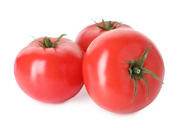 Photo of Many ripe red tomatoes isolated on white
