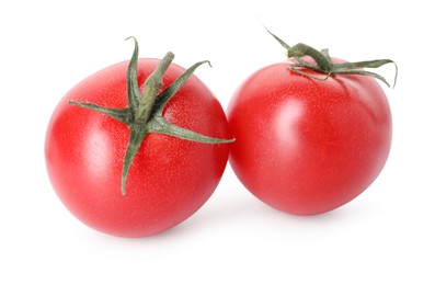 Photo of Two ripe red tomatoes isolated on white