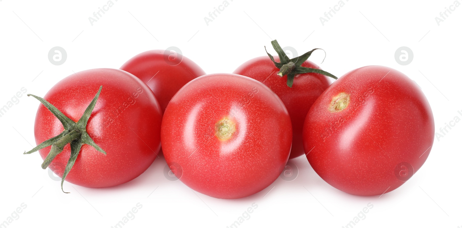 Many ripe red tomatoes isolated on white Photo of Many ripe red tomatoes isolated on white
