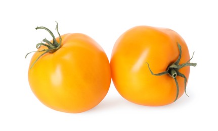 Photo of Two ripe yellow tomatoes isolated on white