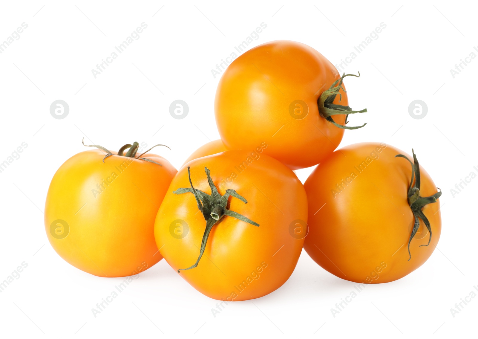 Photo of Many ripe yellow tomatoes isolated on white