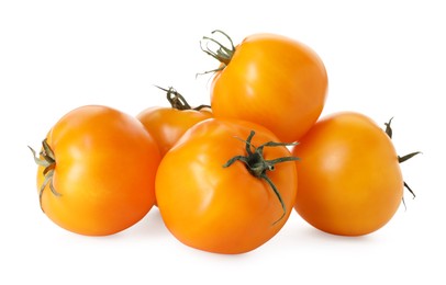 Photo of Many ripe yellow tomatoes isolated on white