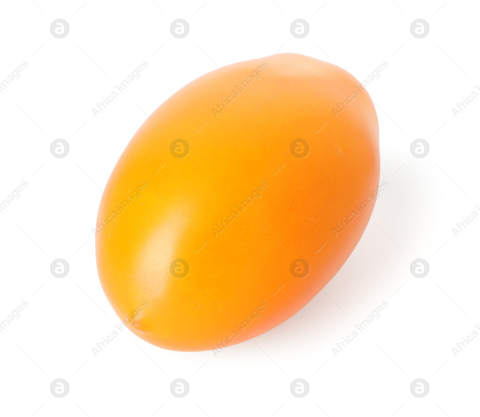 One ripe yellow tomato isolated on white Photo of One ripe yellow tomato isolated on white