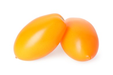 Photo of Two ripe yellow tomatoes isolated on white