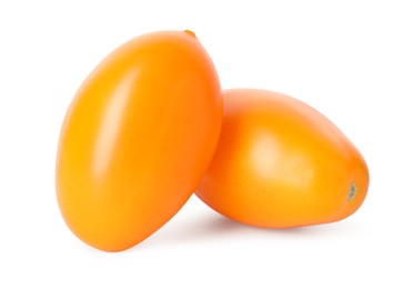 Photo of Two ripe yellow tomatoes isolated on white