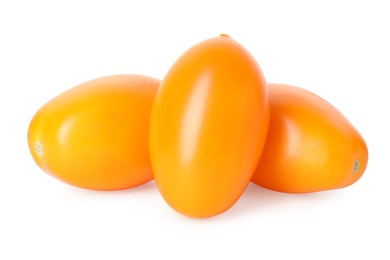 Photo of Many ripe yellow tomatoes isolated on white