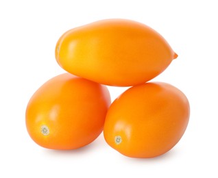 Photo of Many ripe yellow tomatoes isolated on white