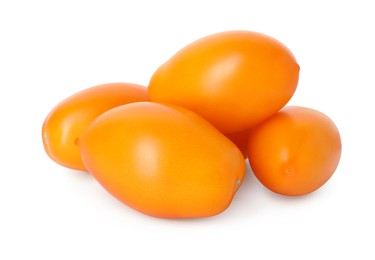 Photo of Many ripe yellow tomatoes isolated on white