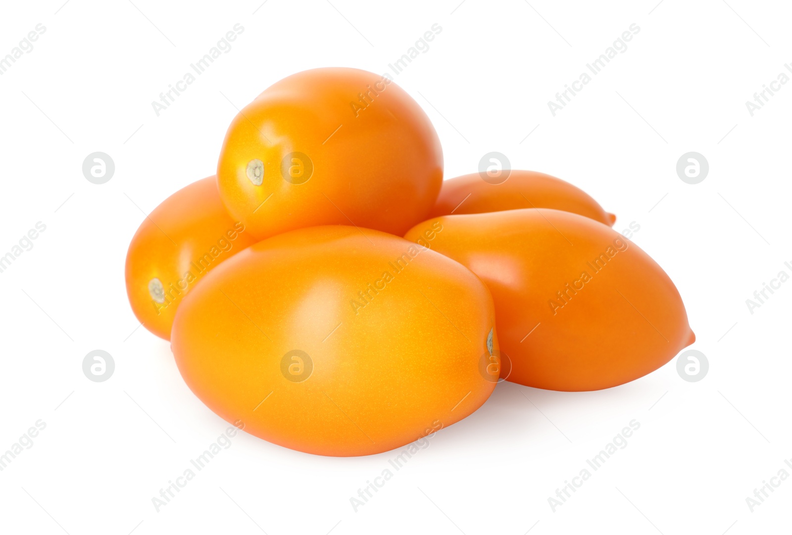Many ripe yellow tomatoes isolated on white Photo of Many ripe yellow tomatoes isolated on white