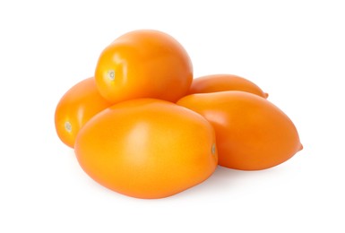 Photo of Many ripe yellow tomatoes isolated on white
