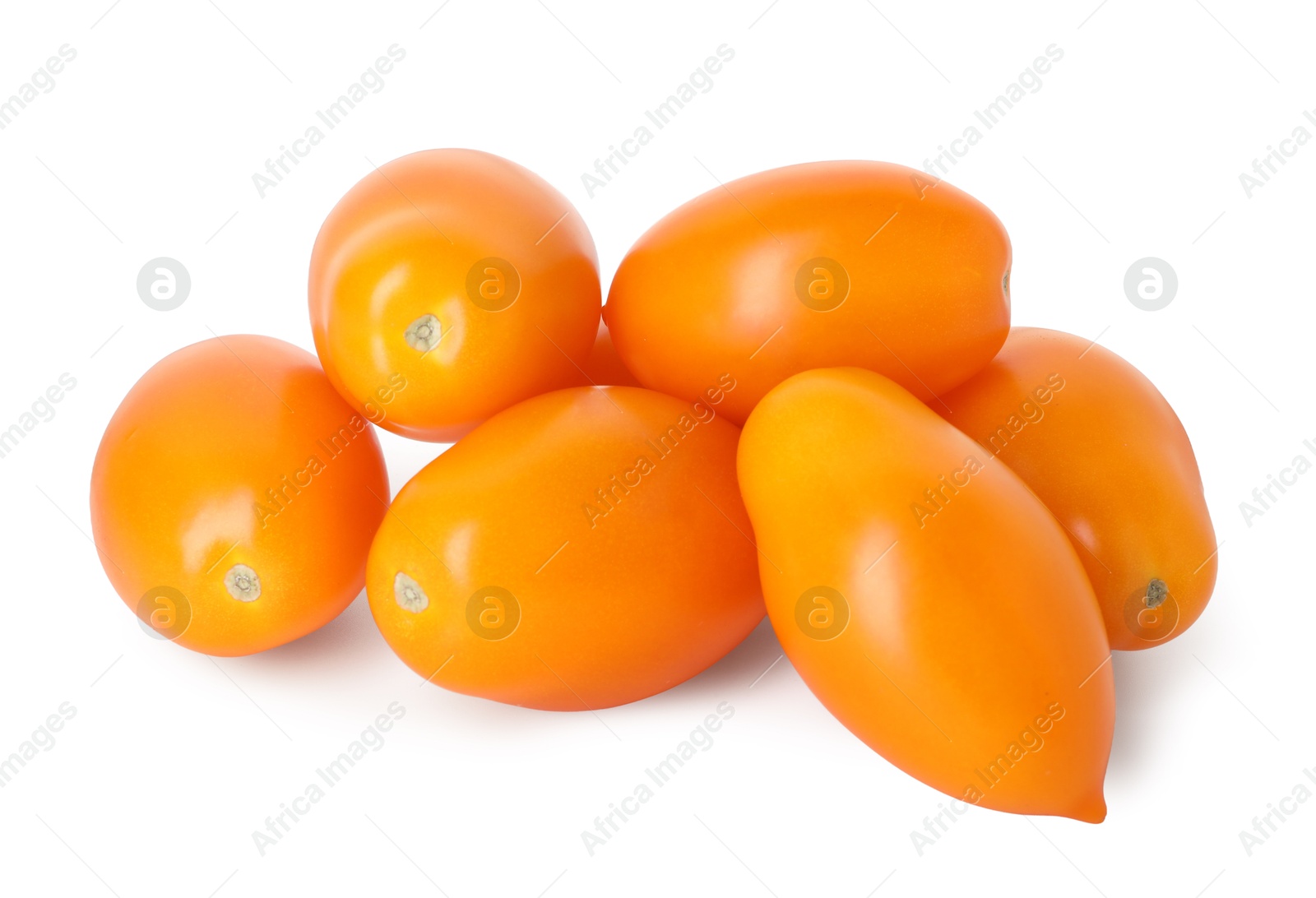 Many ripe yellow tomatoes isolated on white Photo of Many ripe yellow tomatoes isolated on white