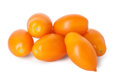 Photo of Many ripe yellow tomatoes isolated on white