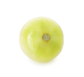 Photo of One unripe cherry tomato isolated on white
